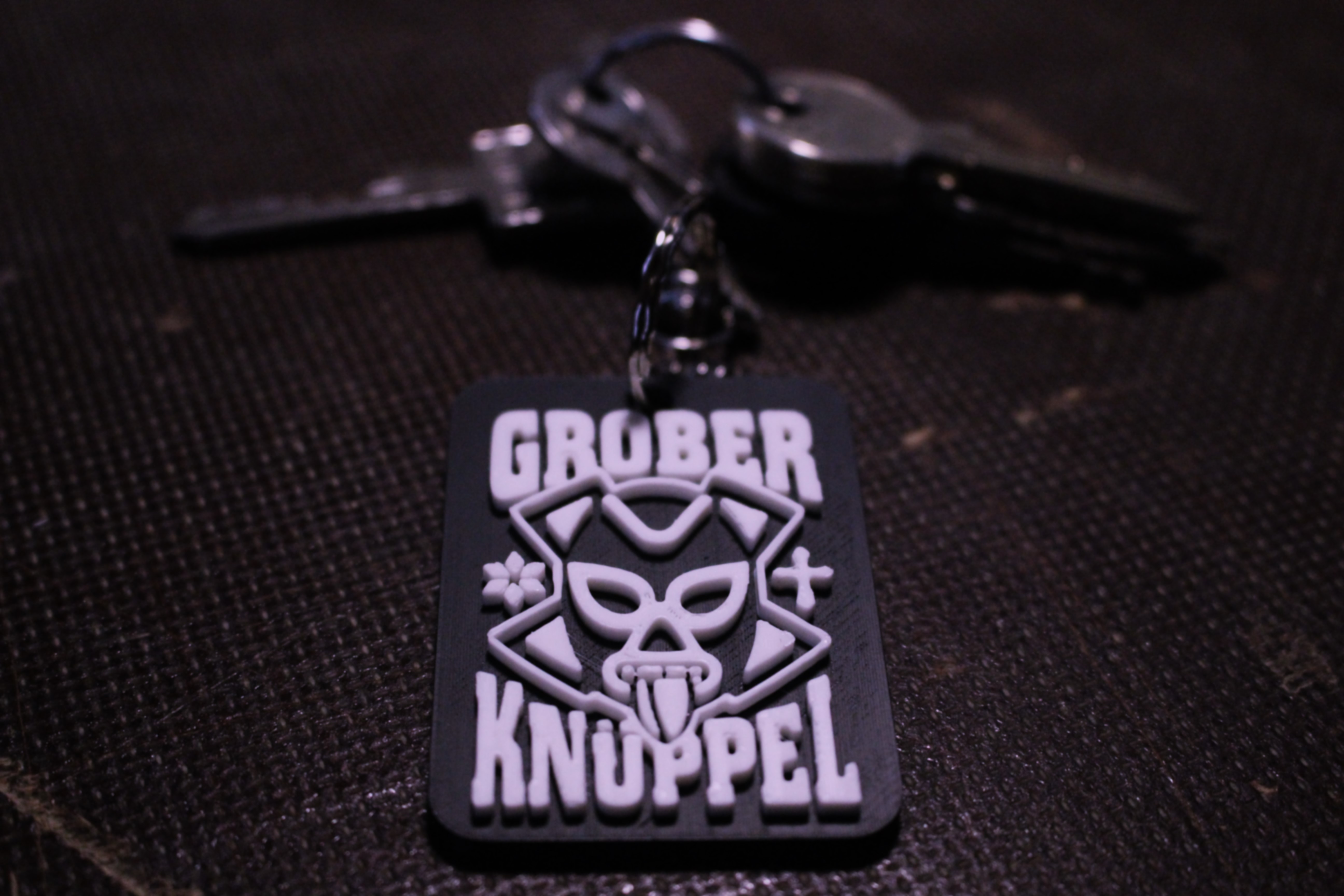 GROBER KNÜPPEL "MASKE" Schlüsselanhänger